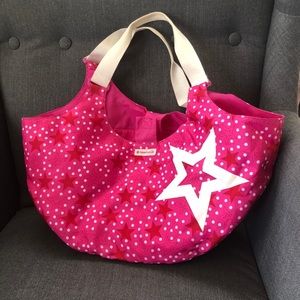 American girl purse. Holds 2 dolls